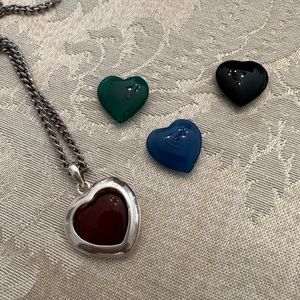 Sterling changeable heart locket with 4 stones.